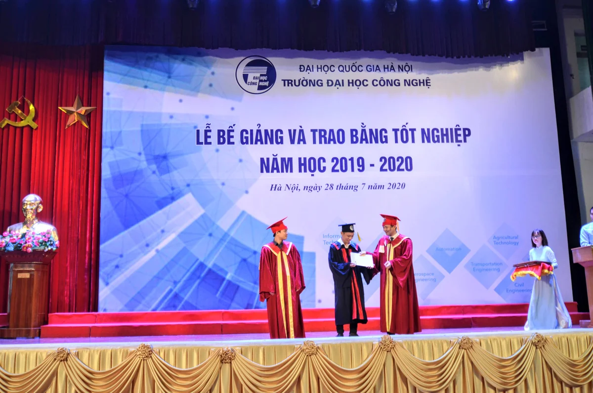 Me receiving my certificate from the Dean of UET and Head of Department of Computer Science